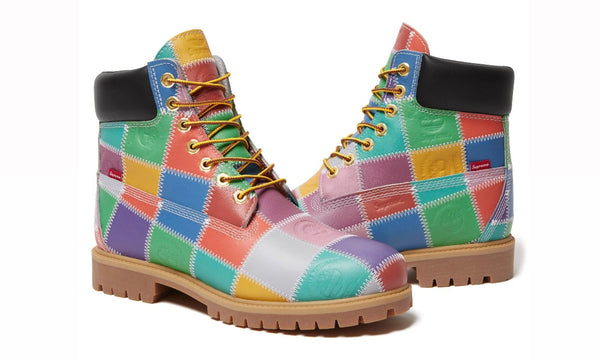 Timberland Supreme Multi-Color 6" Premium Waterproof Boot, angled pair of patchwork boots in blue, green, pink and white on gum soles