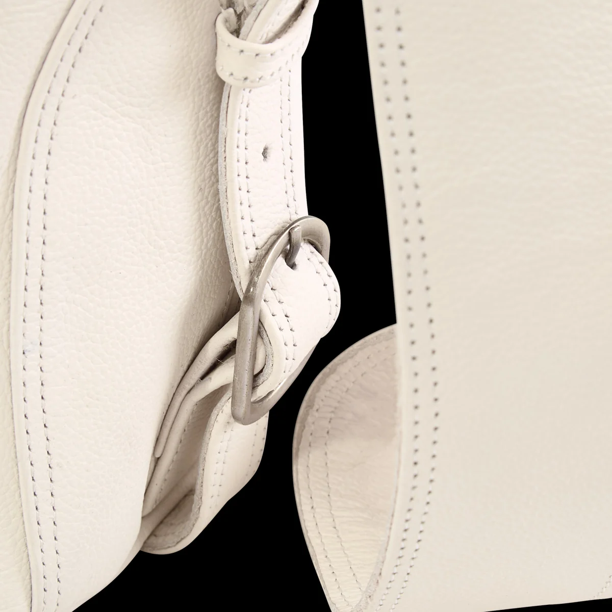 GV Gallery Cream Shoulder Bag, close-up of the strap buckle and stitched edges
