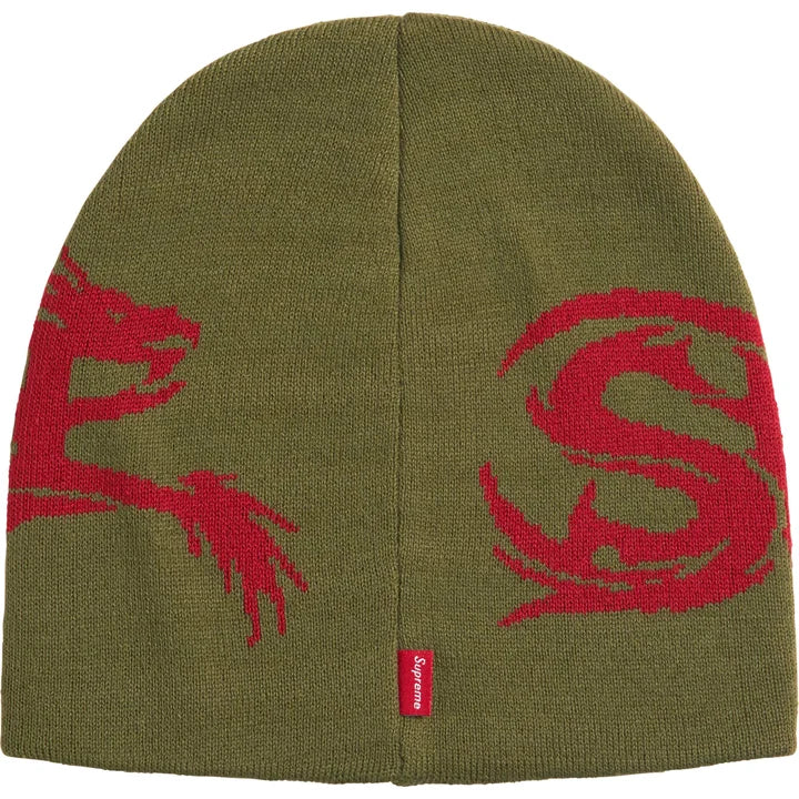 Back of the olive Supreme Dragon beanie showing the red dragon tail, a large S and a red woven tab