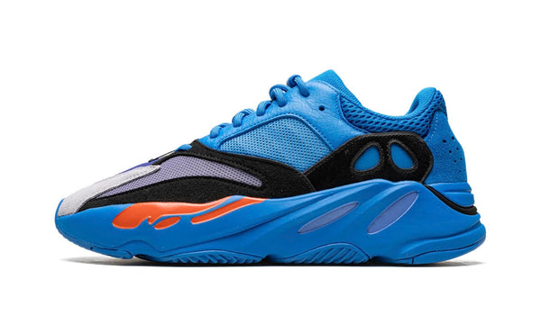 Adidas Yeezy 700 Hi Res Blue, bright blue mesh runner in profile, black and lavender panels, orange forefoot sole pod