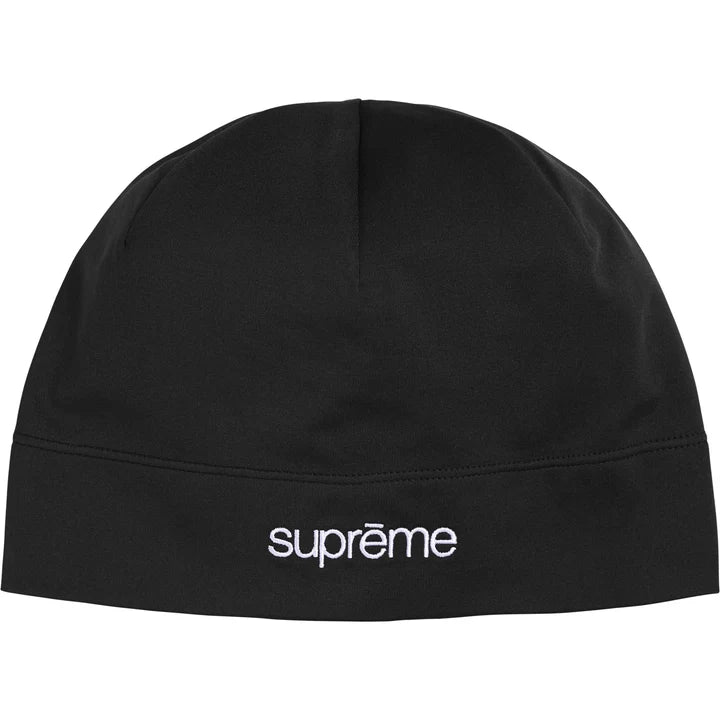 Supreme Base Layer beanie in smooth black stretch fabric with a white Supreme logo at the front hem