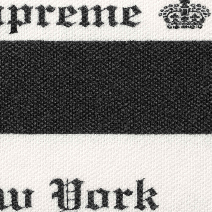 Close-up of the black and white jacquard knit with Supreme crown and New York text