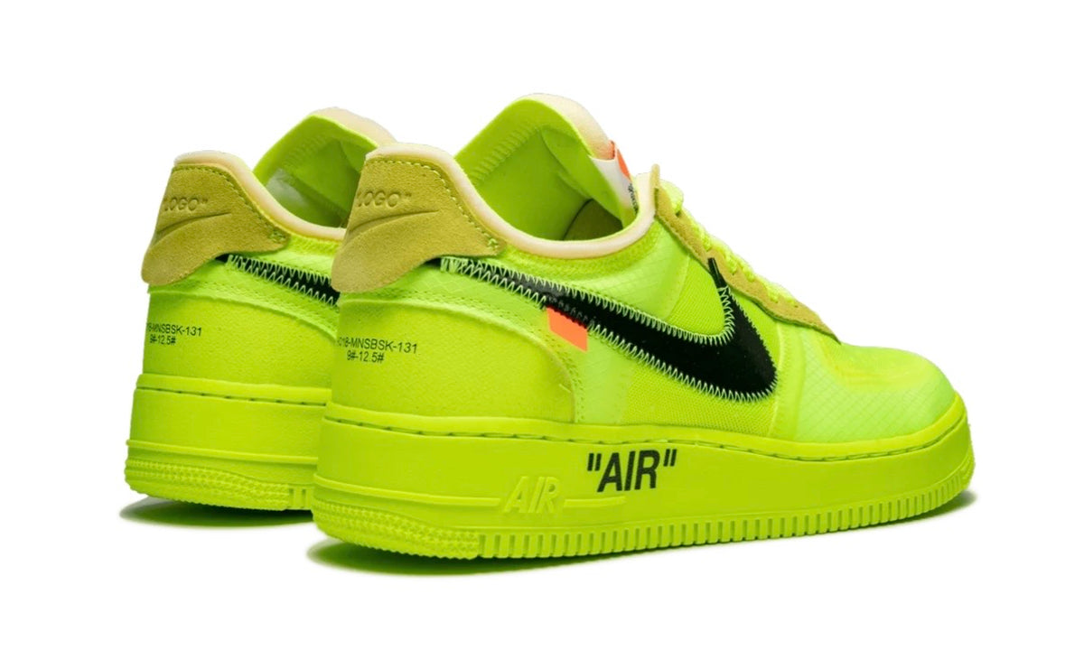 Nike Air Force 1 Low Off-White Volt pair from the rear — suede LOGO heel tab, orange tab and AIR midsole text