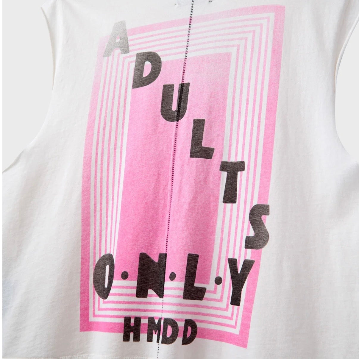 HMDD Vegas Cutoff, close-up of the back print, black ADULTS ONLY letters inside concentric pink lines over HMDD