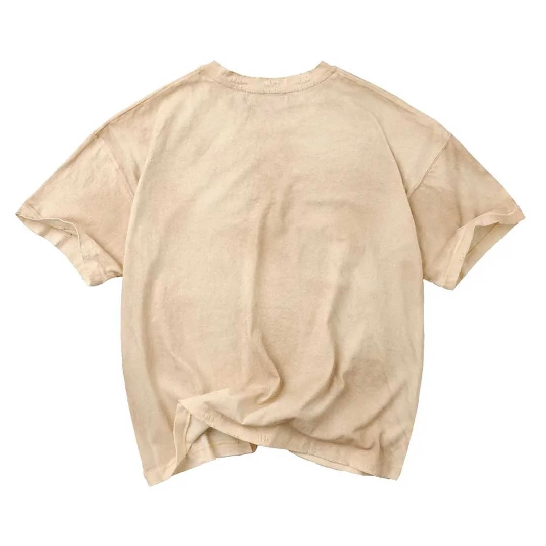 Back of the Vale cream Dogyard tee, plain with a washed vintage finish