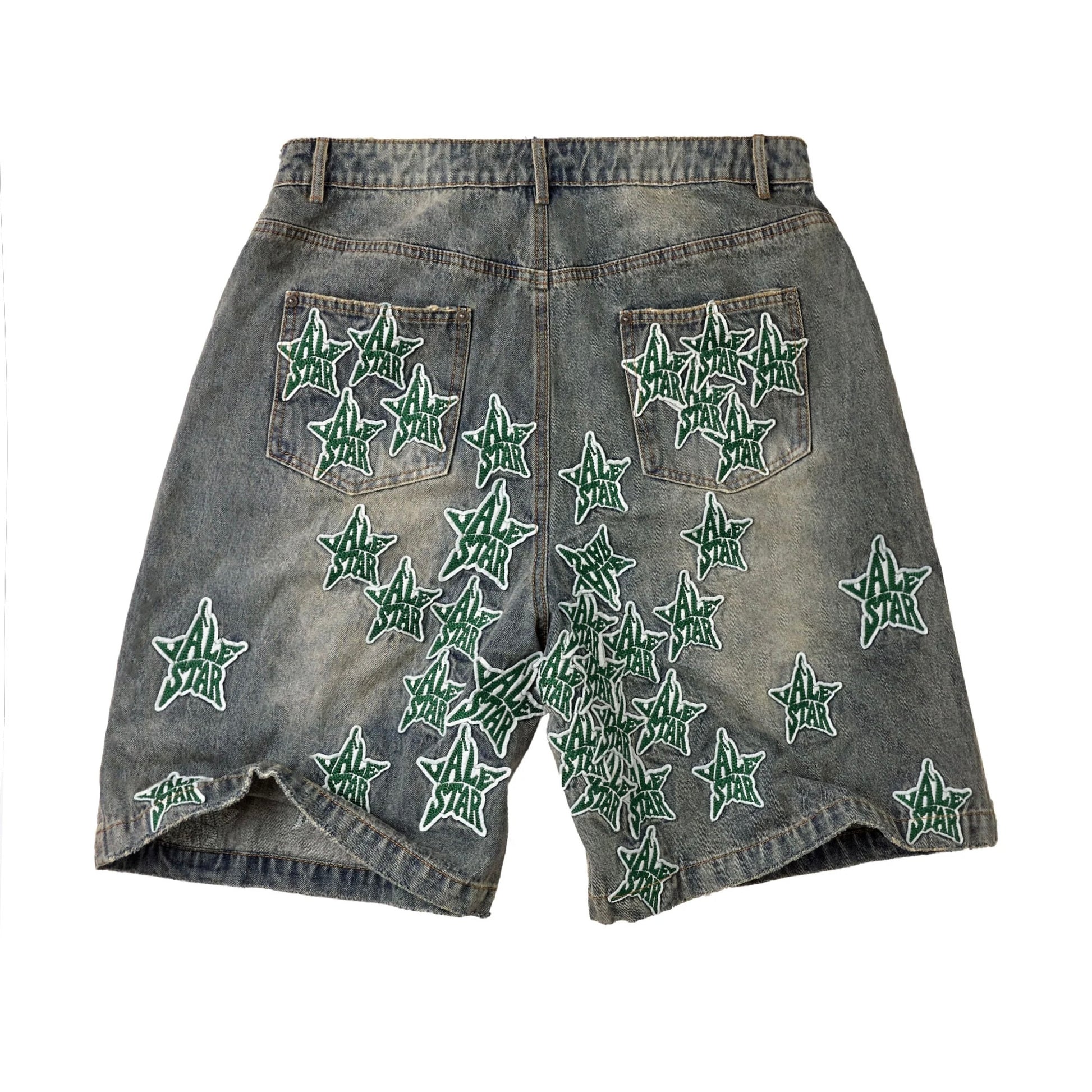 Vale Allstar Jorts, back view of the washed denim jorts, green star patches across the seat and legs above frayed hems