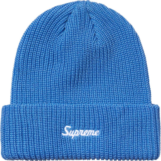 Bright azure blue chunky ribbed beanie with white Supreme script on the cuff