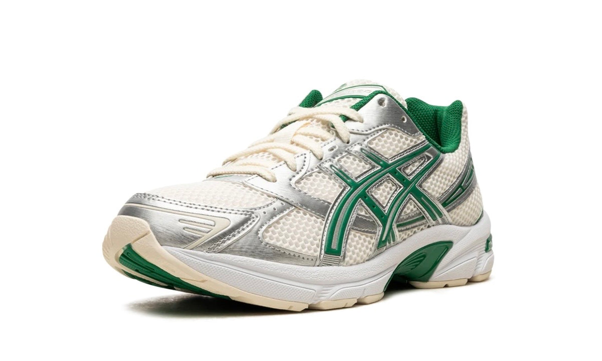Asics Gel-1130 Cream Kale, front three-quarter view of the cream and silver upper