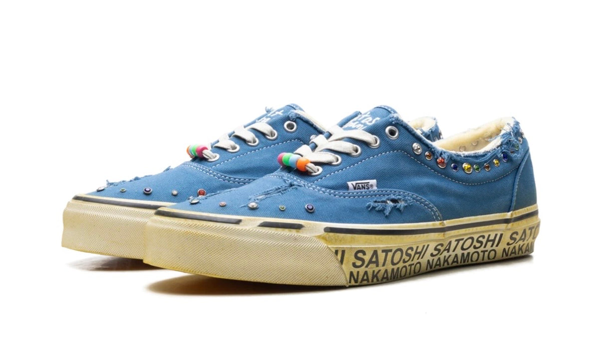 Pair of Vans Era 95 Satoshi Nakamoto Lucky Charm from the front, studded collars and charms