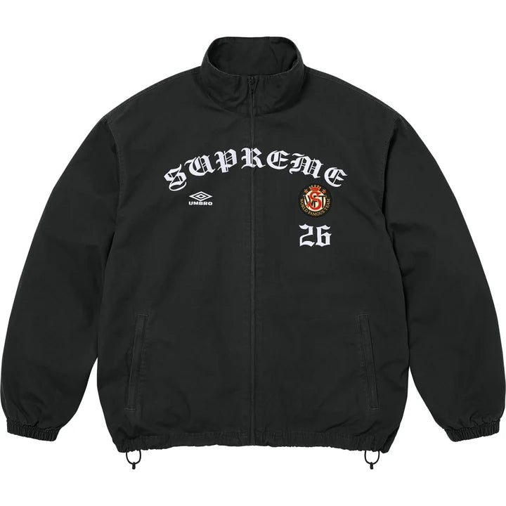Supreme x Umbro cotton ripstop track jacket in black with white gothic SUPREME arch, Umbro diamond logo, crest patch and 26, front view