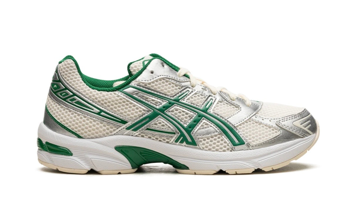 Asics Gel-1130 Cream Kale, medial side view with green stripes and silver detailing