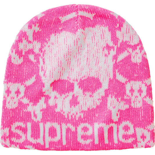 Supreme x Vanson skull beanie in bright pink with an allover white skull and crossbones knit and a large skull above the Supreme wordmark