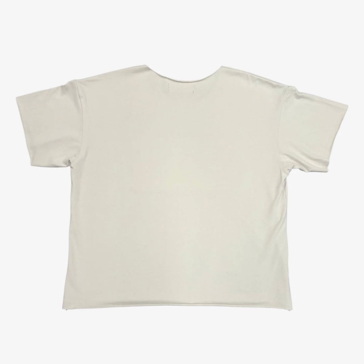 Plain back of the cream boxy short sleeve tee with wide collar and raw hem