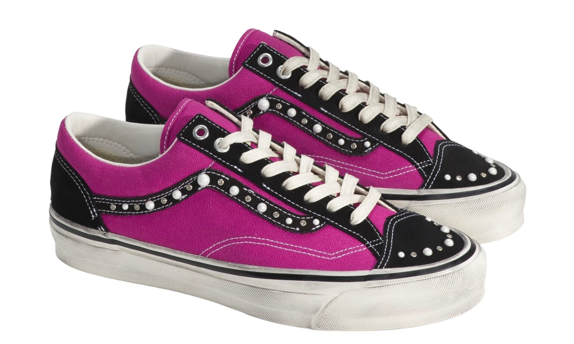 Vans OTW Old Skool 36 Pearlized Pack Pink Black, angled three-quarter view of the pair with white laces and scuffed white foxing