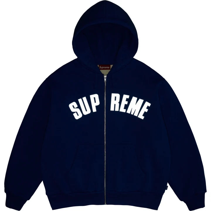 Royal blue Supreme Arc Thermal zip hoodie photographed with flash, the arc logo showing bright white