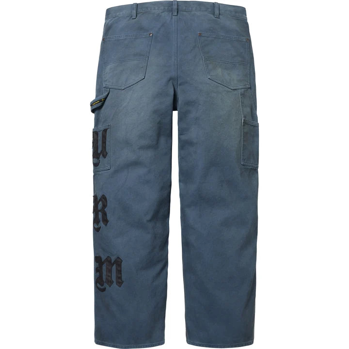 Supreme Leather Applique Double Knee Painter Pants back view with blackletter leather lettering down the leg