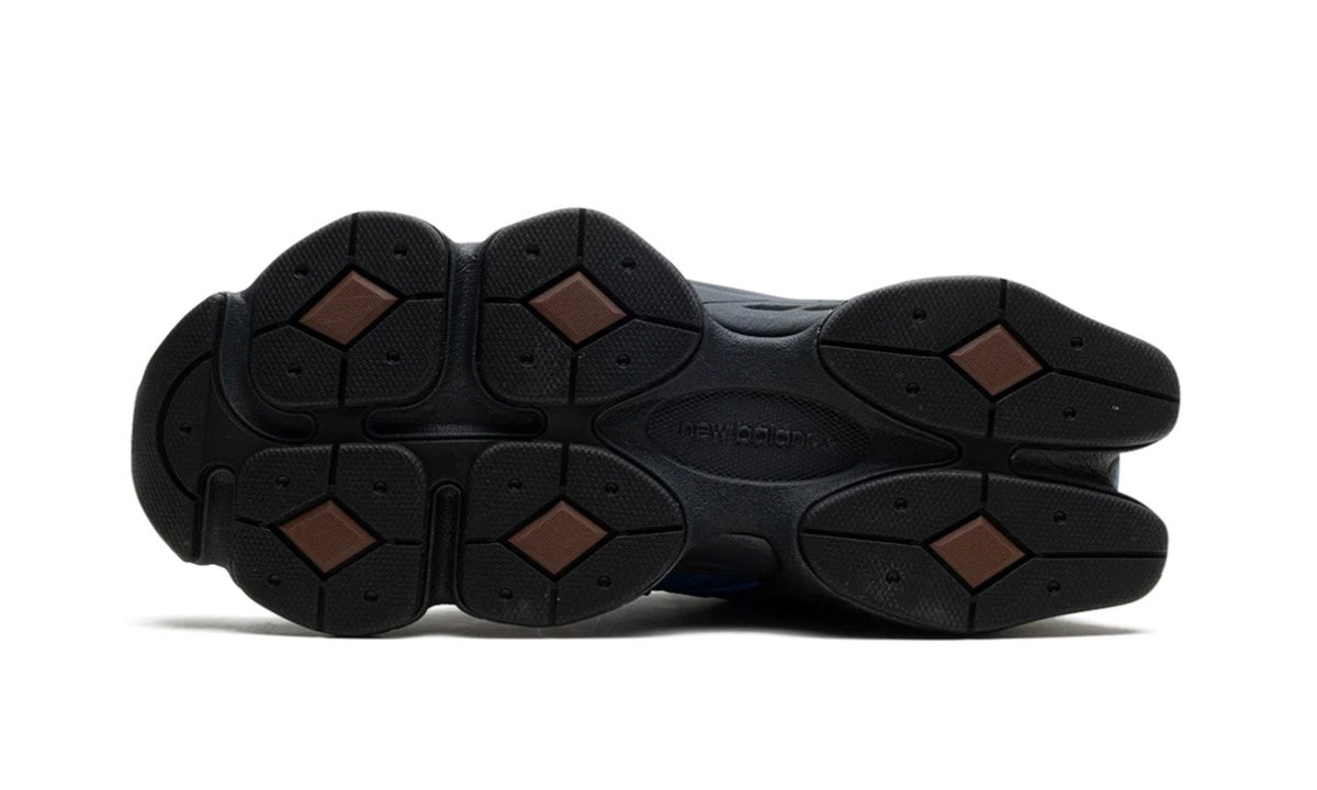 New Balance 9060 Dark Royal Brown, black outsole with brown diamond traction pads