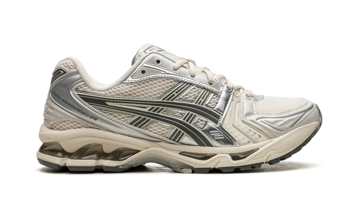 Asics Gel-Kayano 14 Birch Dark Pewter, medial side profile showing the GEL midsole windows