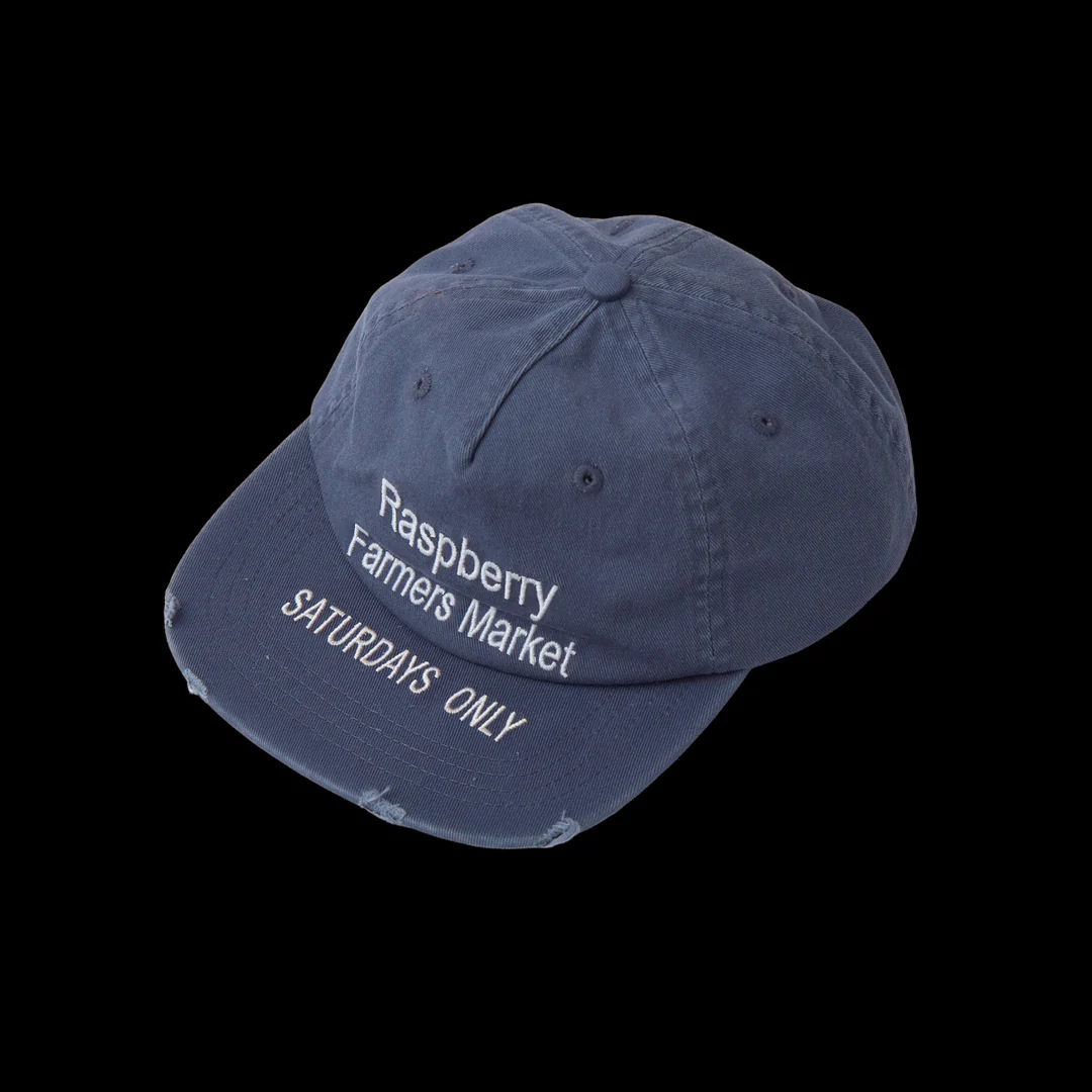 GV Gallery Farmers Market Hat, washed navy cap with white Raspberry Farmers Market embroidery and Saturdays Only on the frayed brim