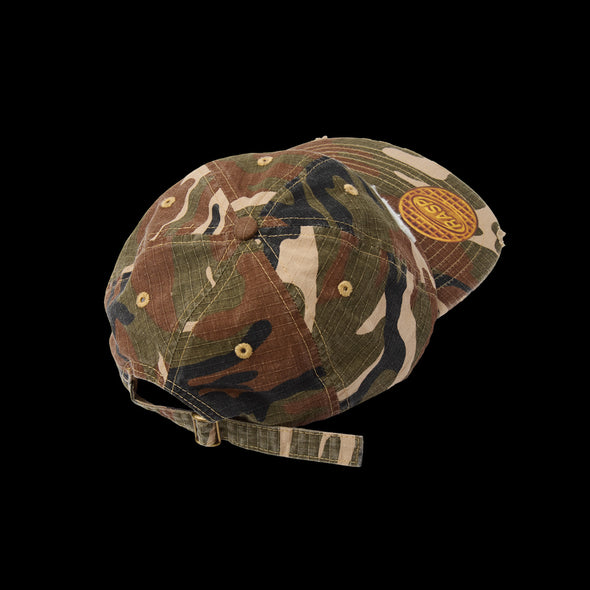 Rear three-quarter of the camo dad hat with strapback and waffle brim patch