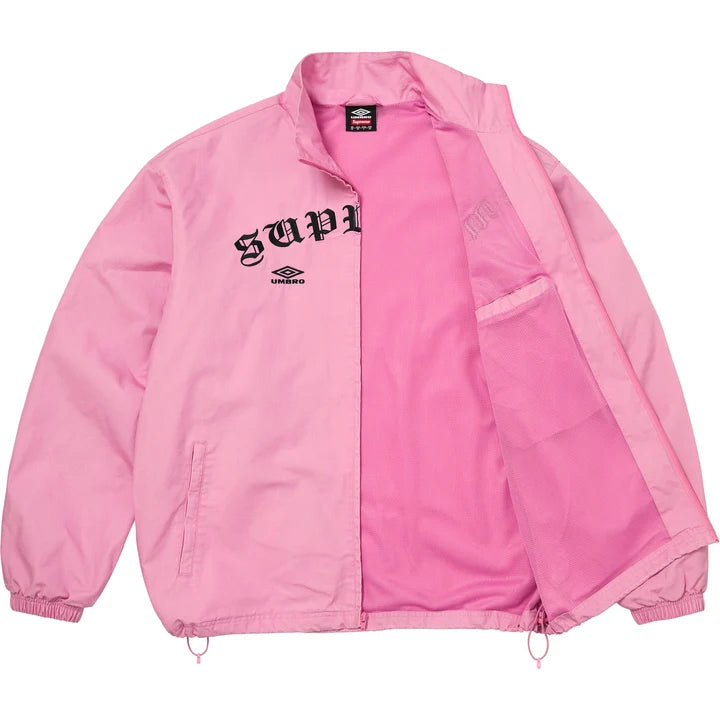 Pink Supreme x Umbro track jacket unzipped, showing the pink mesh lining