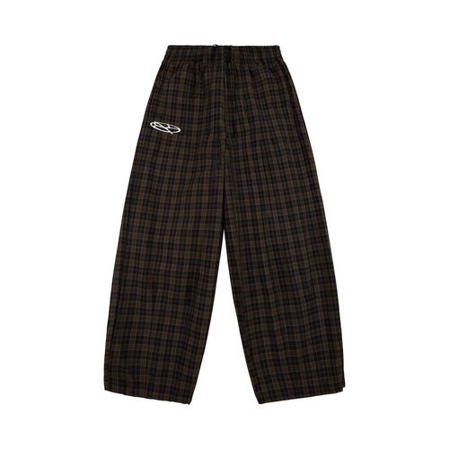 Boredom Kills Black Brown Plaid Track Pants front flat-lay — full-length wide plaid pants with the white oval logo