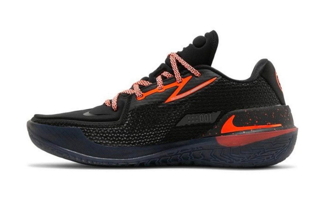 Nike Air Zoom GT Cut EYBL Black, front angle of one shoe, black knit upper with orange swoosh and navy sole
