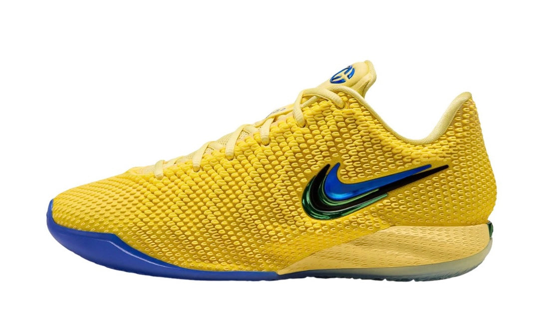 Yellow knit Nike basketball low with iridescent blue-green Swoosh and royal blue sole