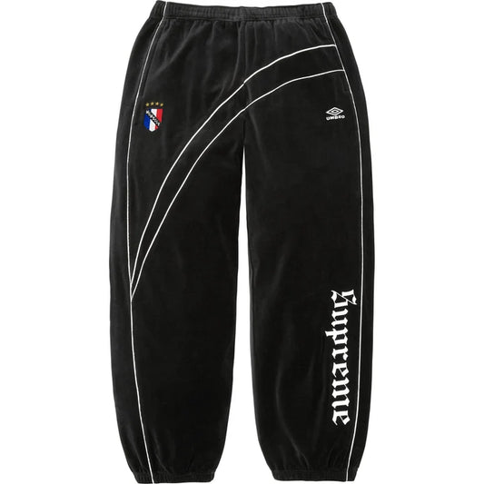 Supreme x Umbro Black Velour Track Pants front view with blackletter Supreme lettering down the leg