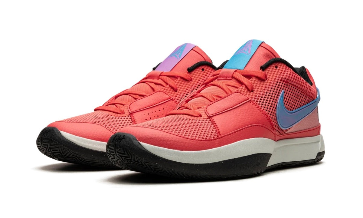 Nike Ja 1 Fuel, pair shown from the front with red mesh and a blue and purple tongue