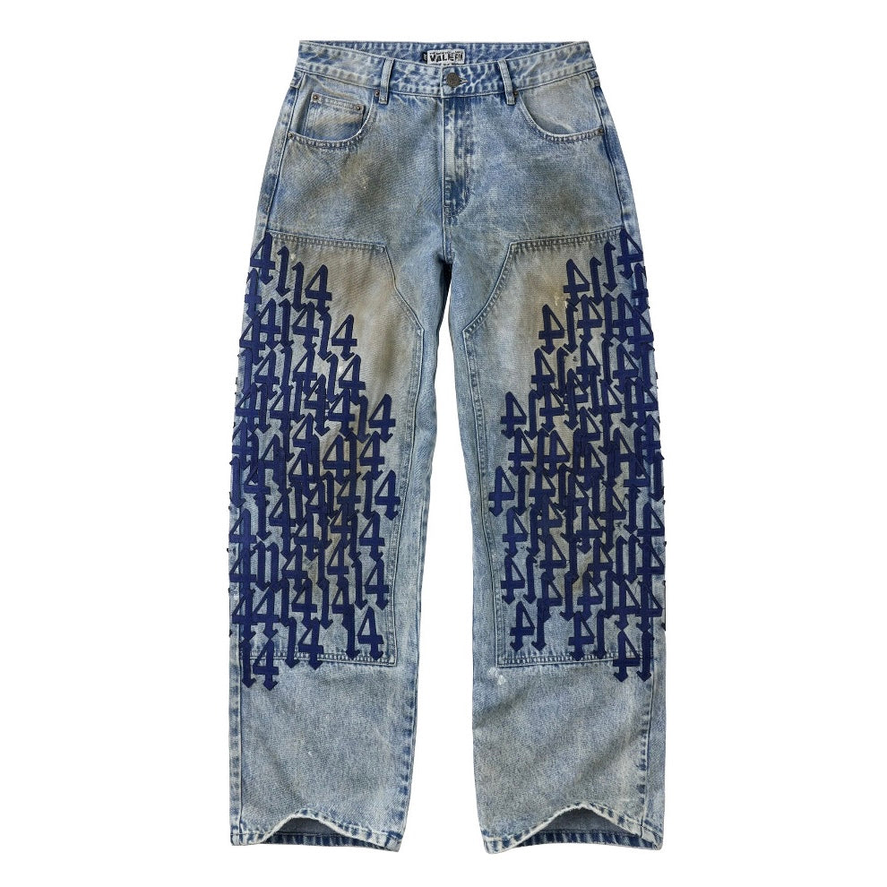 Vale Shipyard Painter Pants, front of light wash baggy denim pants with navy 414 chenille lettering down both legs