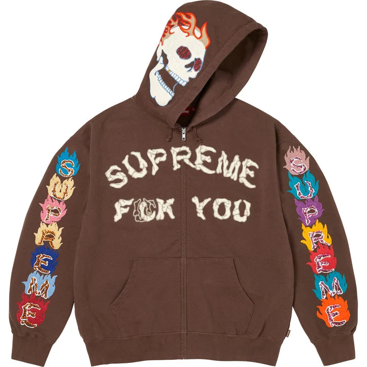 Brown Supreme zip hoodie with the hood up, showing a skull with flames embroidered on the hood