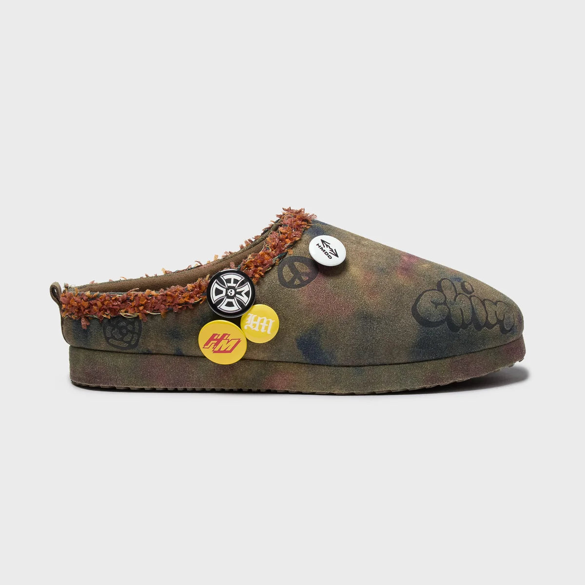 HMDD Graffiti Mule, side profile showing the graffiti Chim script on the toe and orange trim around the collar