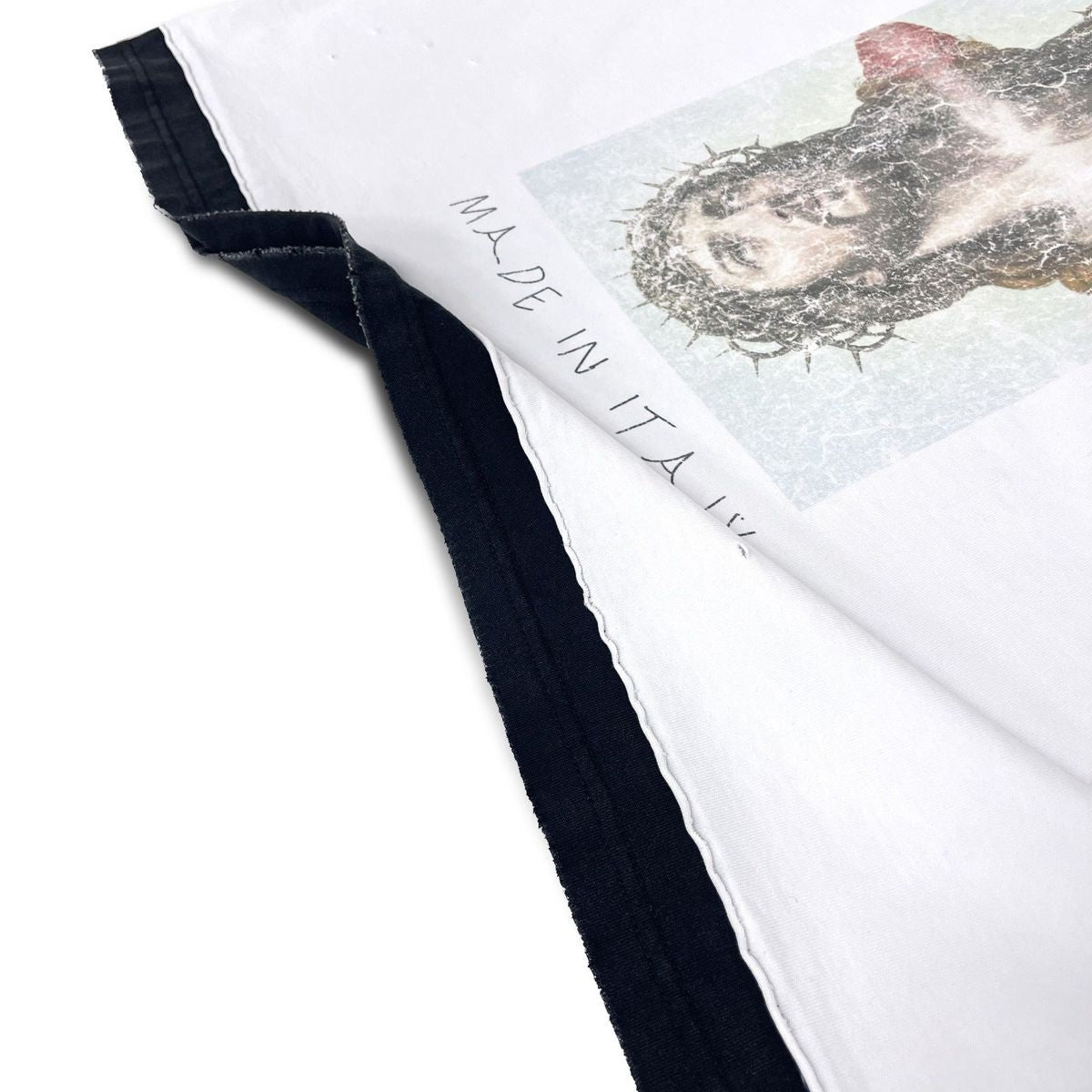 Stile De Amor White Peace of Amor T-Shirt, close-up of the navy sleeve cuff and the small MADE IN ITALY text on white