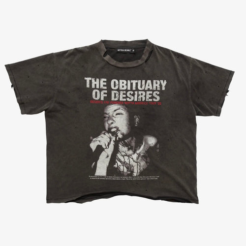 Bottega Desires Obituary tee in washed charcoal with THE OBITUARY OF DESIRES headline over a black and white photo of a singer, front view