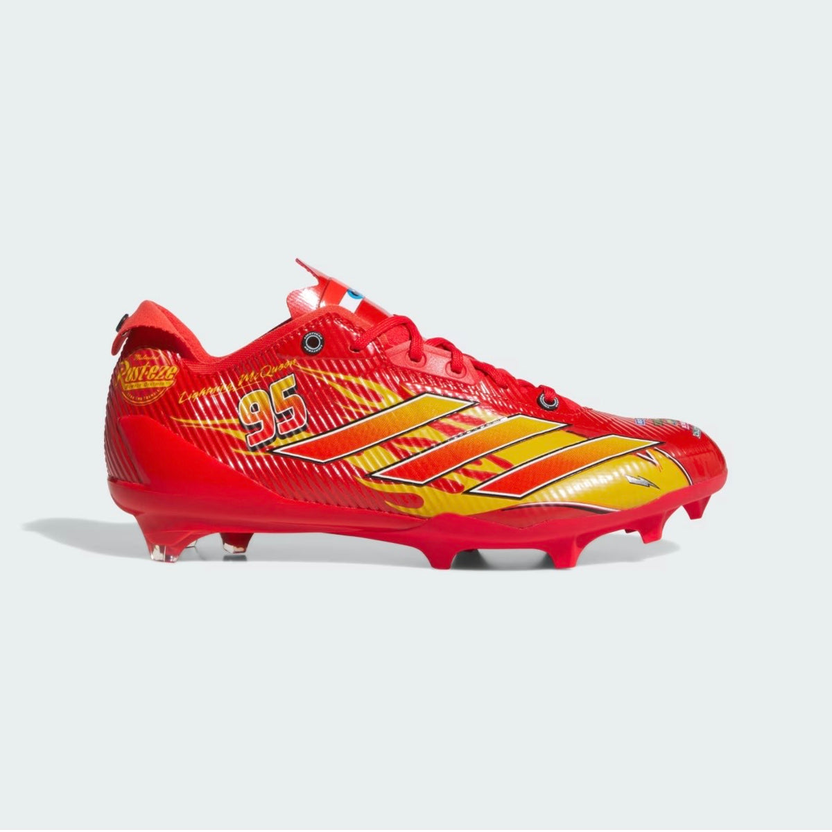 Adidas Pixar Cars Adizero Electric II cleats lateral three-quarter — gradient three stripes and full stud layout