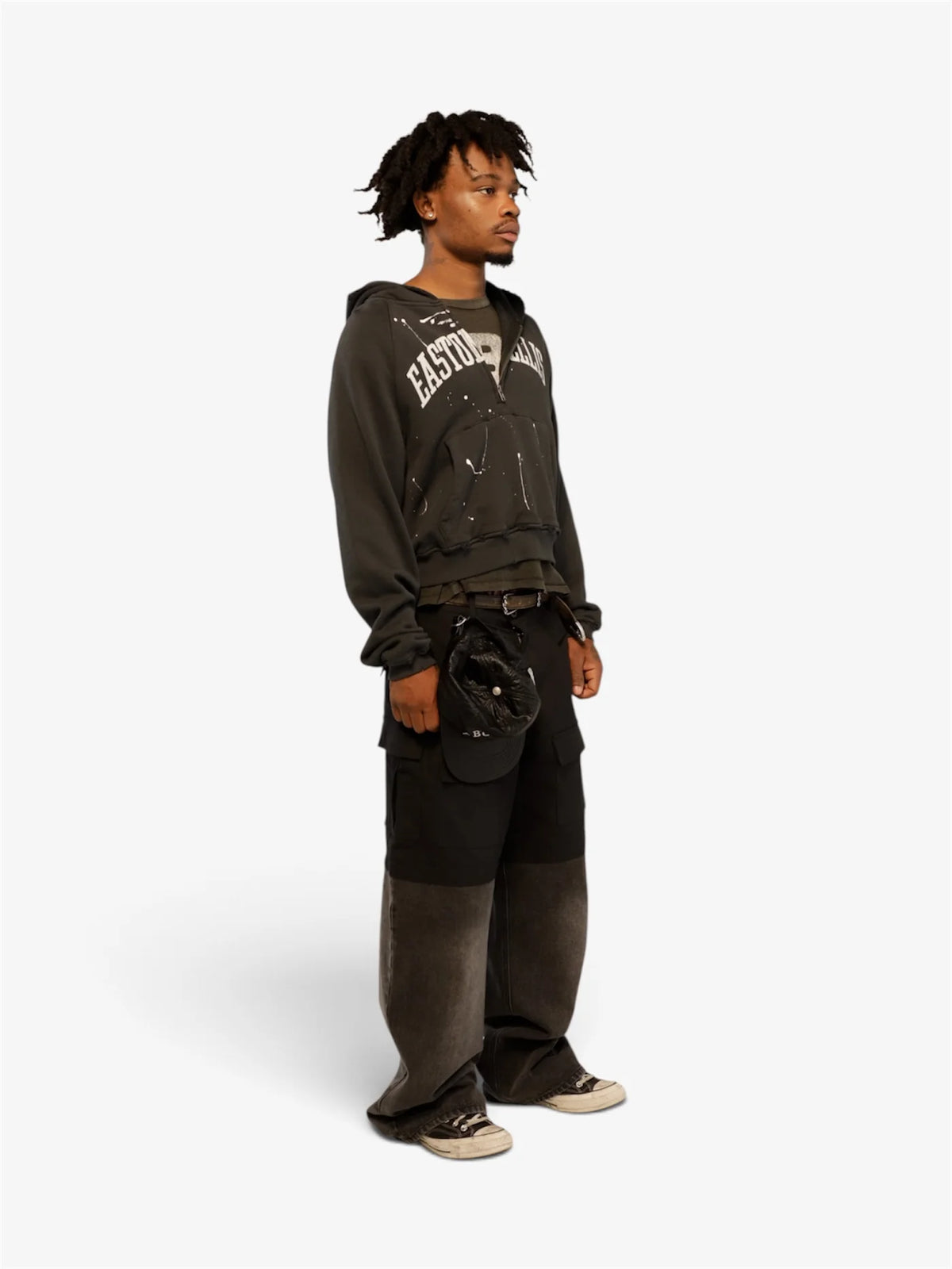 Model wearing the Easton Ellis half zip hoodie, side view