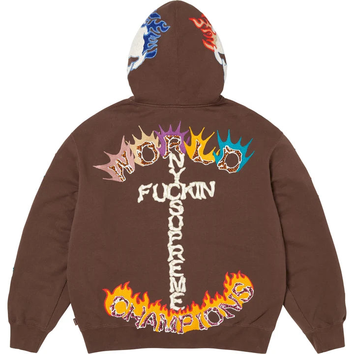 Back of the brown Supreme zip hoodie with flaming chain-stitch lettering forming a cross