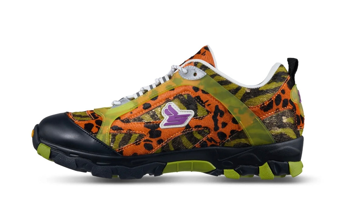 Sicko x xVessel hiking shoe with orange tiger and leopard print upper, black rubber toe, lime trim and purple laces, lateral side view