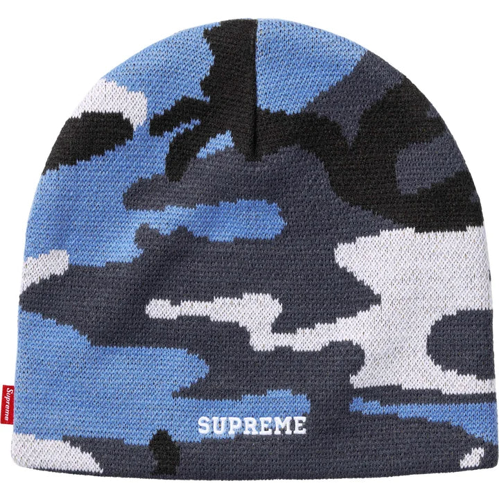Back of the blue camo Supreme x Nike Oval beanie with white SUPREME lettering