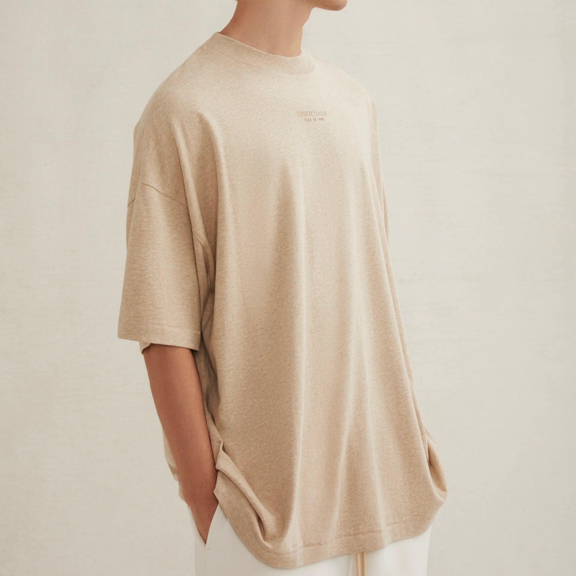 Fear of God Essentials Gold Heather T-Shirt On Body View
