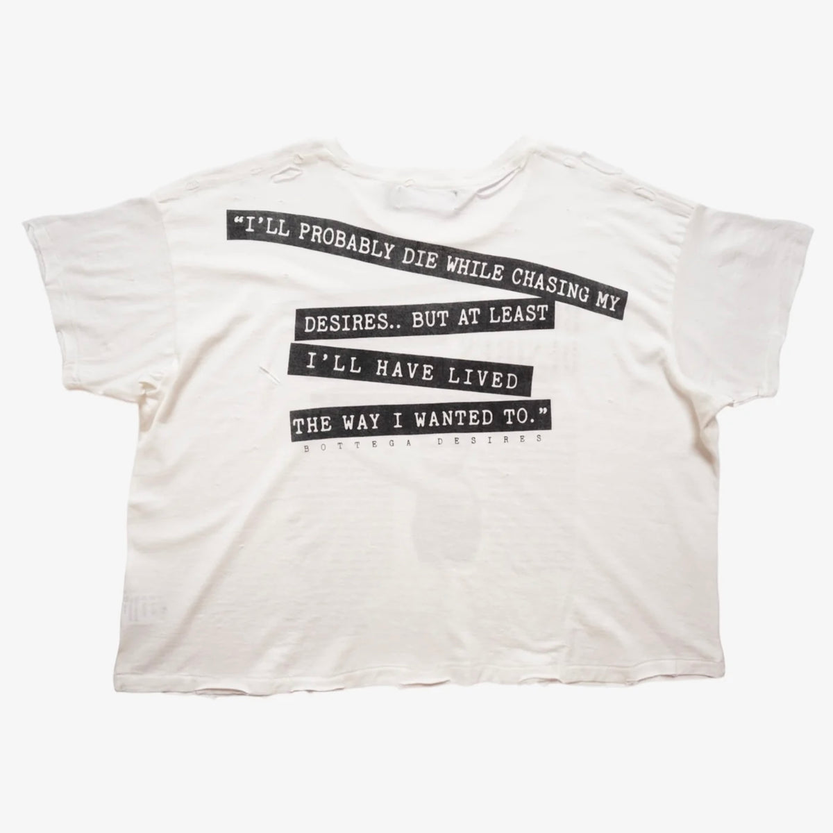 Back of the Interview tee with a quote printed in white type on black strips