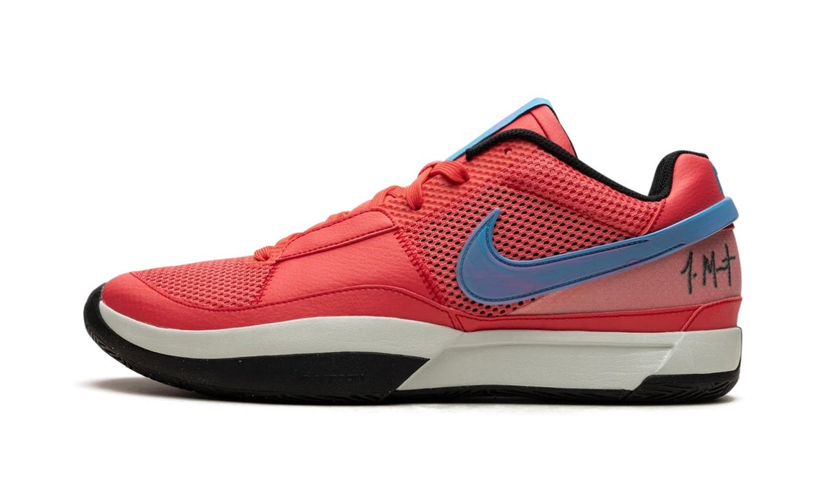 Nike Ja 1 Fuel, lateral side of the coral red mesh low-top with an iridescent blue Swoosh and Ja's signature on the heel