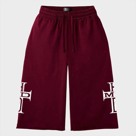 HMDD Maroon HC 3/4 Shorts front flat-lay — maroon fleece shorts with a white cross monogram on each leg