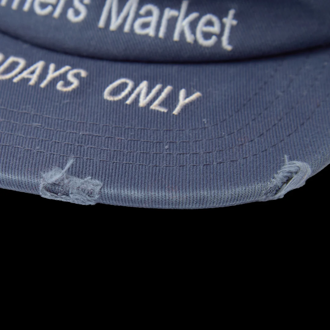 GV Gallery Farmers Market Hat, close-up of the Saturdays Only brim embroidery and frayed edge