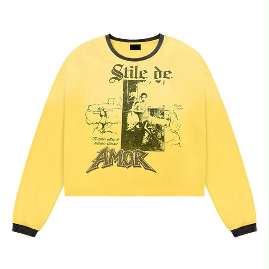 Stile De Amor Stresso Long Sleeve, faded yellow long sleeve with black collar and cuffs, a vintage photo and Stile De Amor lettering