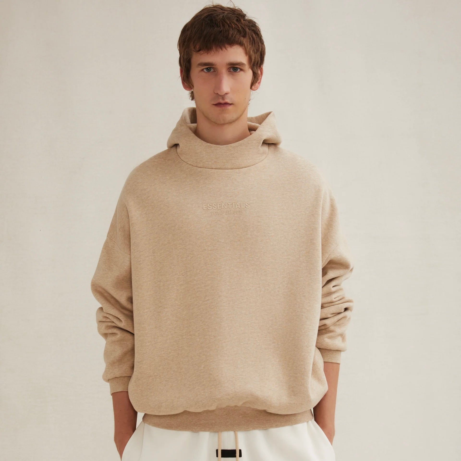 Fear of God Essentials Gold Heather Hoodie On Body View