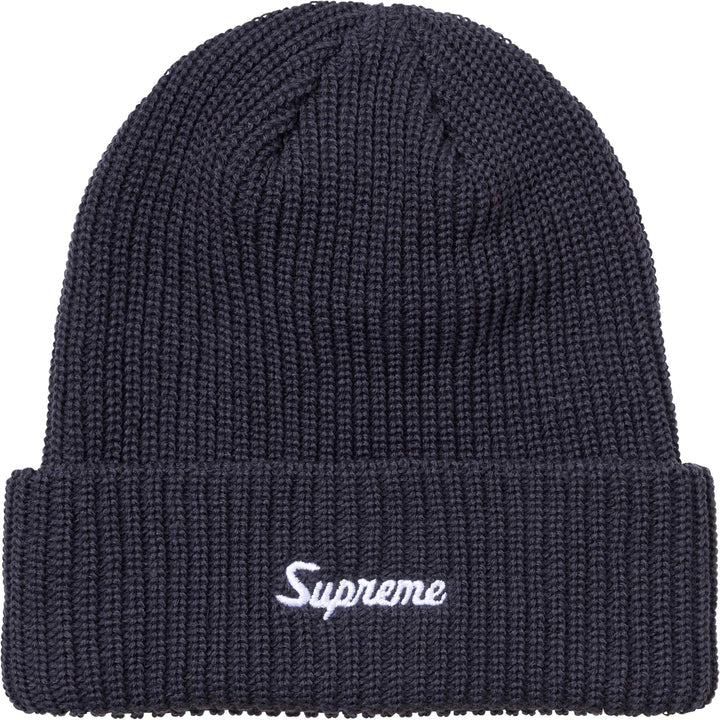Dark navy chunky ribbed beanie with white Supreme script on the folded cuff