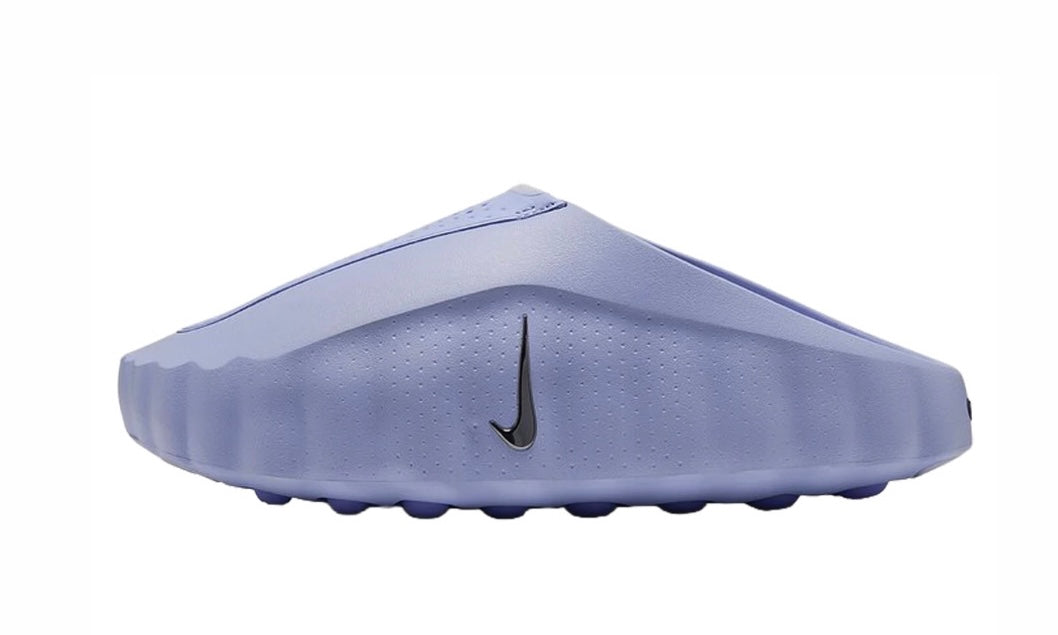 Nike Mind 001 in palest purple, a ridged slip-on mule with a black Swoosh, side view
