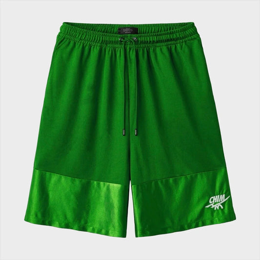 HMDD Green Air Shorts front flat-lay — green shorts with lighter contrast lower panels and white CHIM embroidery